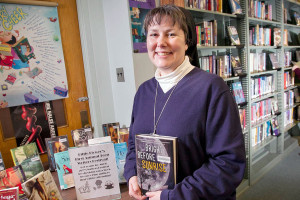 Sister Kimberly Miller of Little Flower H.S. is organizing its 1st Little Flower Teen Author Festival. Photograph in school library with display of books written by young authors that will attend the festival. Picture taken on Thursday afternoon February 20, 2014. ( ALEJANDRO A. ALVAREZ / STAFF PHOTOGRAPHER )